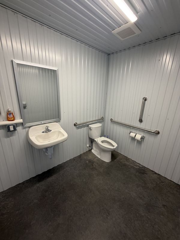 Finished half bath with grab bars