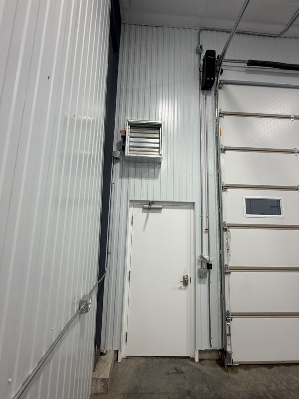 Service door beside the overhead door