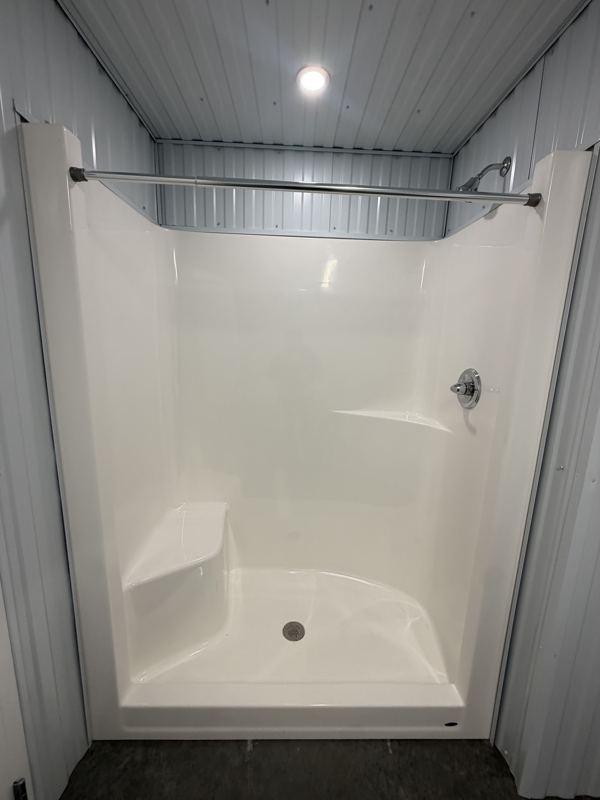 Shower in Unit 406’s full bathroom