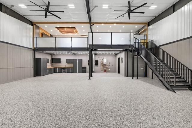 Unit 417-418: Main floor with full-width mezzanine and staircase